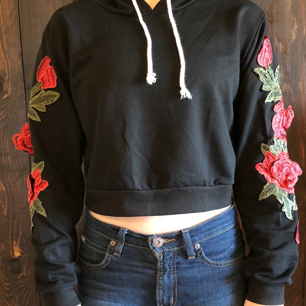 Unique sweatshirt w/ embroidered rose appliqué